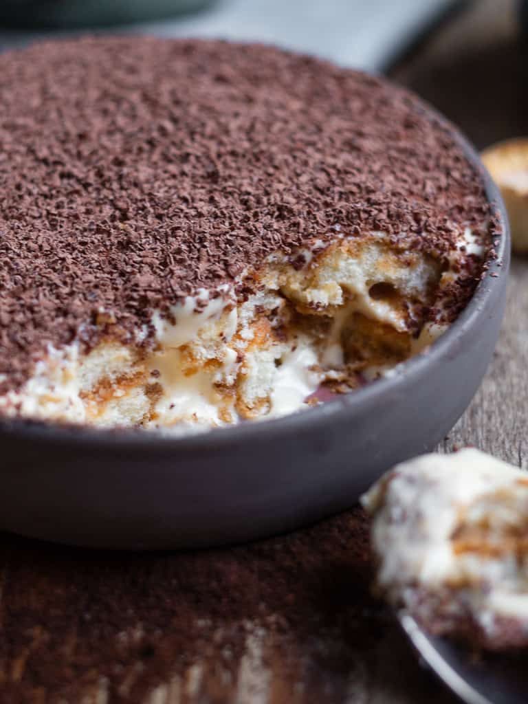 authentic italian Tiramisu in a bowl eaten