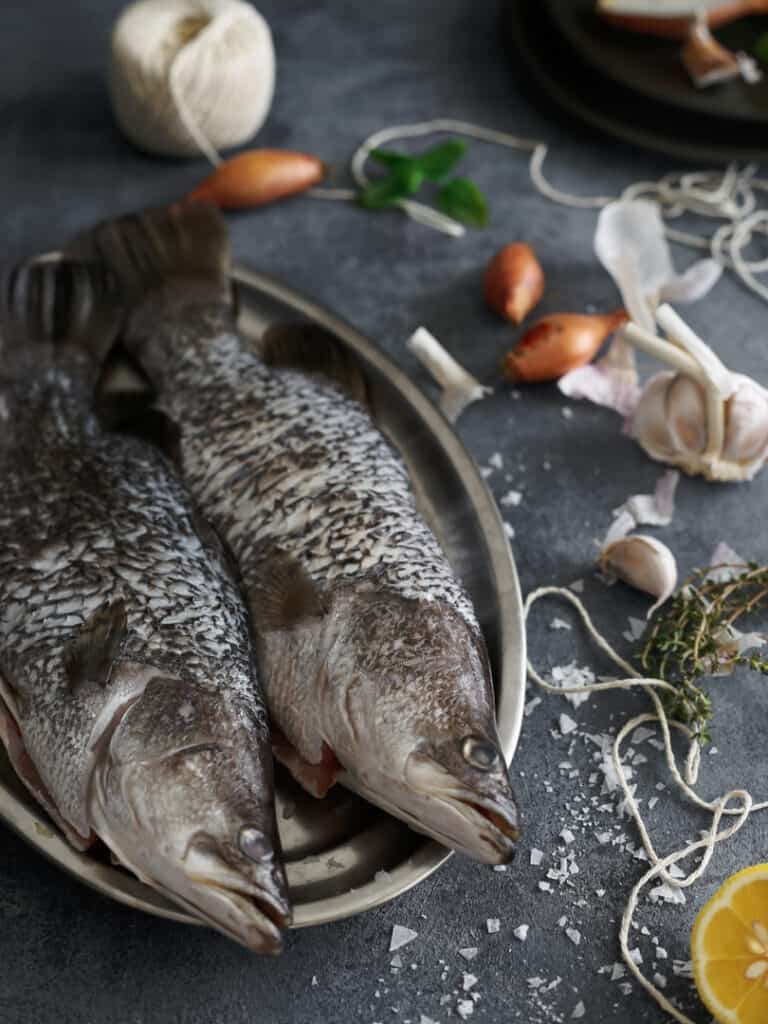 Whole fish stuffed with lemon, garlic and herbs