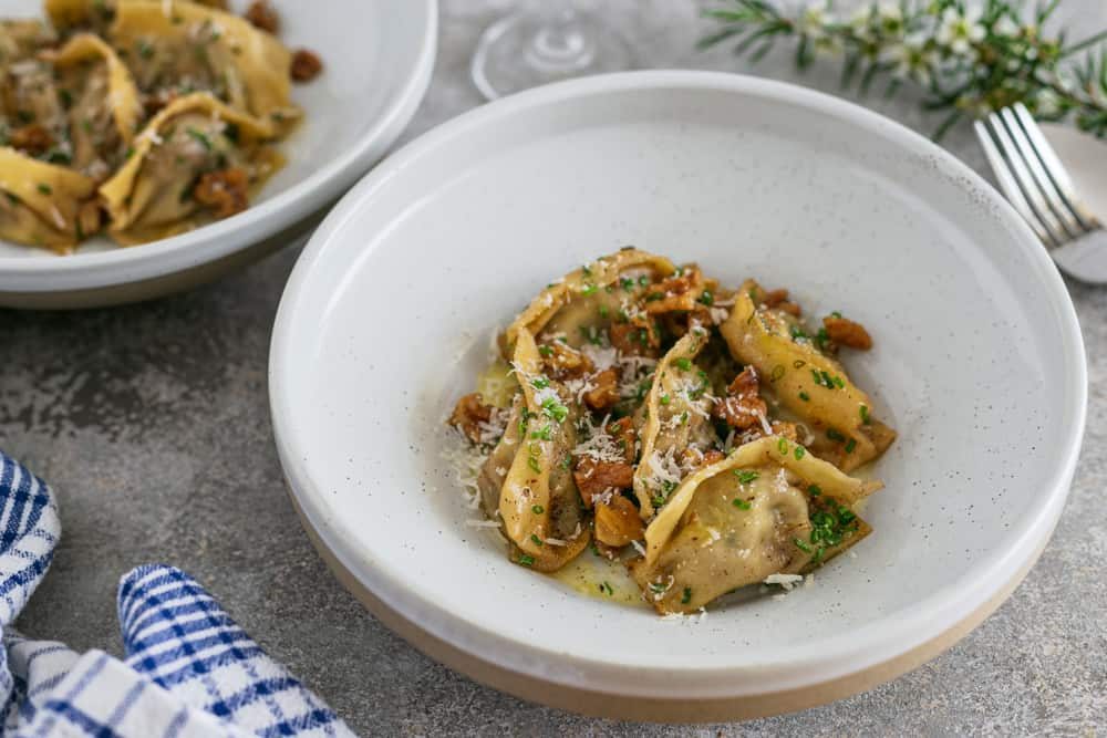 Sweet potato & fermented garlic Agnolotti with walnut butter sauce