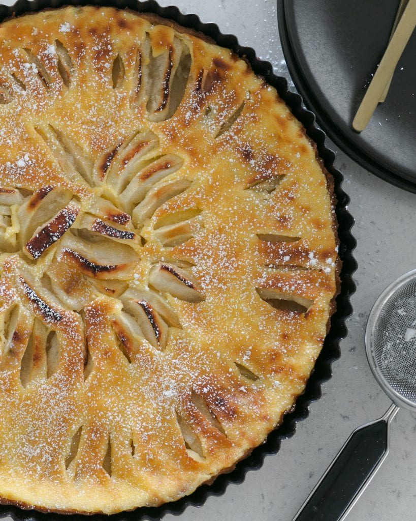 French Apple Tart dusted with icing sugar