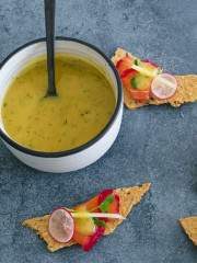 Bowl of Mustard and Dill Sauce with cured salmon canapes