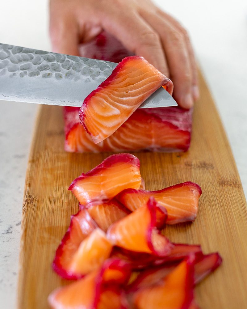 Slicing the cured salmon