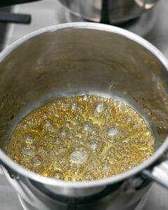 Sugar and water caramalising in the pot
