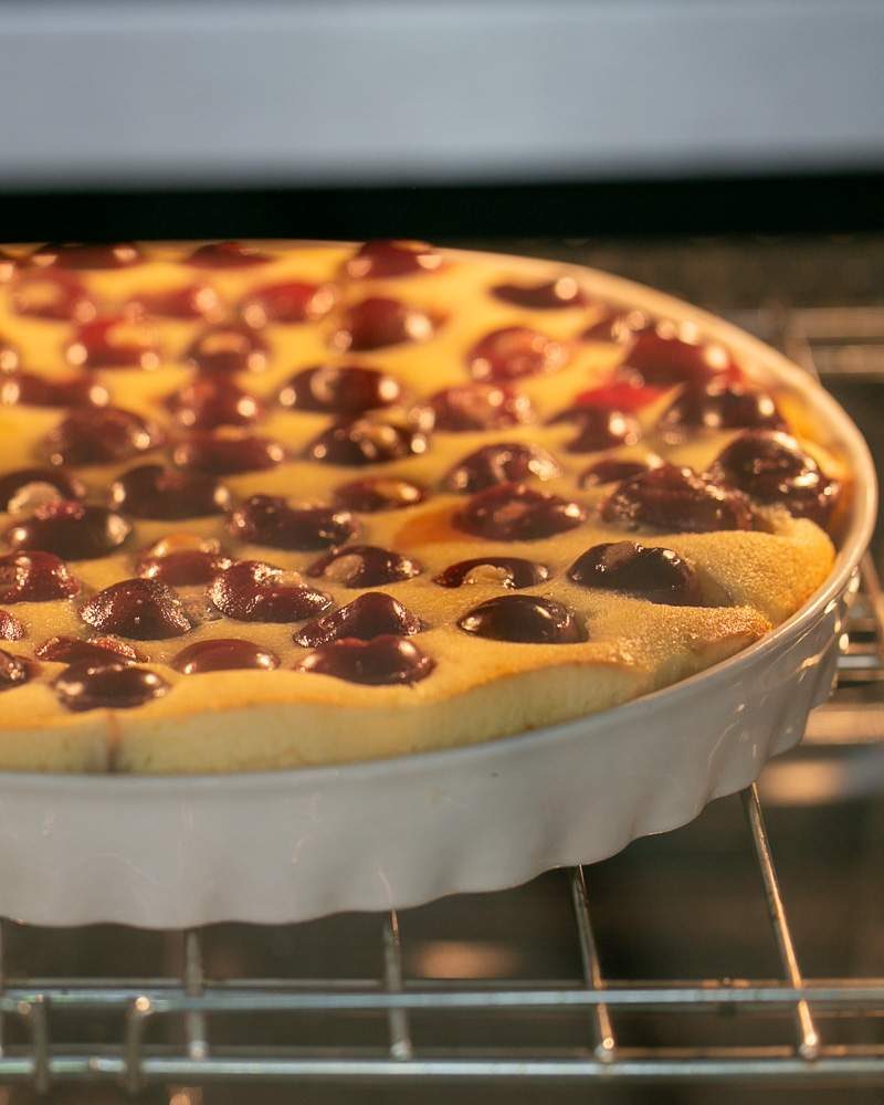 risen clafoutis tart in the oven