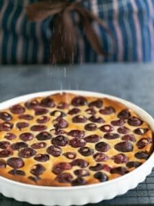 Freshly baked clafoutis dusted with powder sugar