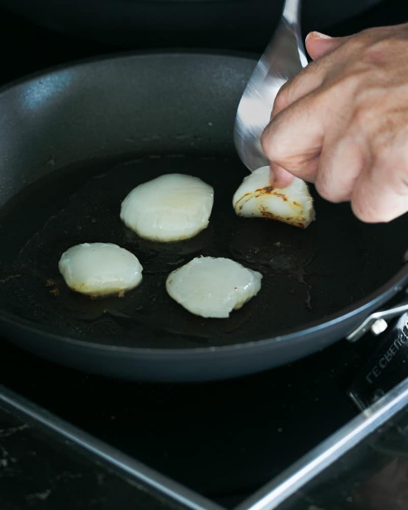 Searing scallops in a hot pan