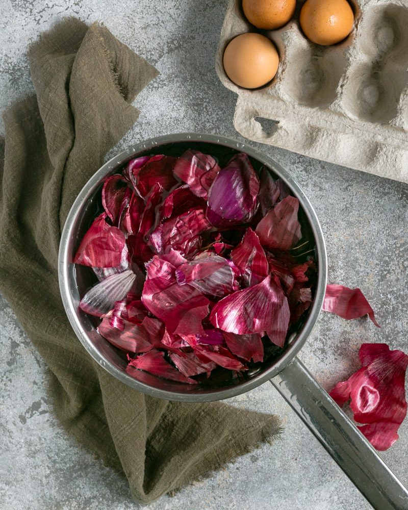 Easter egg colouring with red onion peels