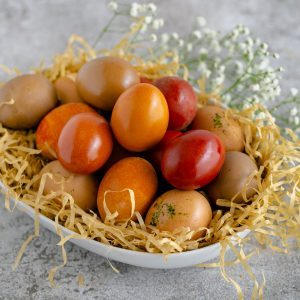 Colored eggs in a bowl