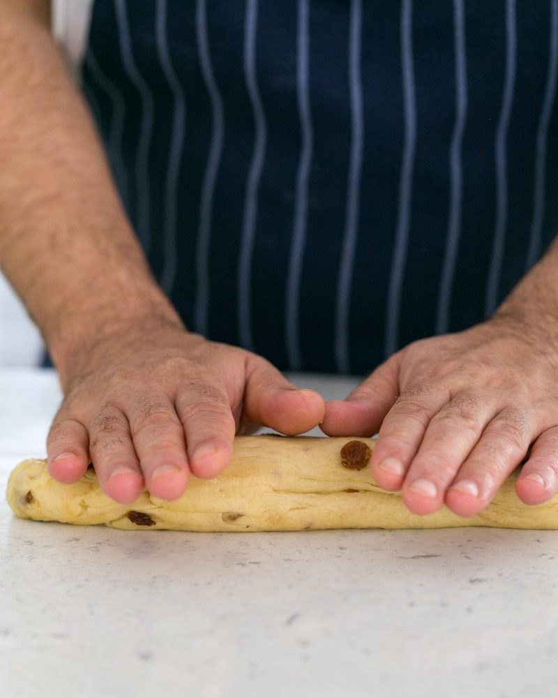 Rolling dough balls into long braids