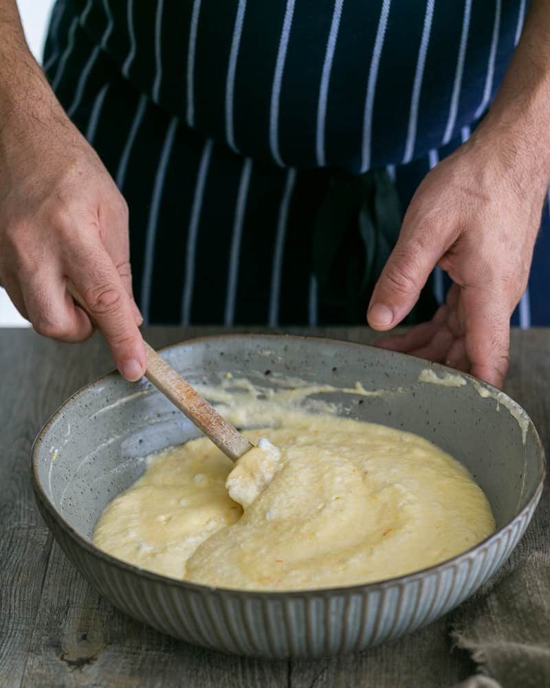 Whipped Egg Whites folded into Pancake Batter for Souffle-style pancakes with fresh ricotta and almonds