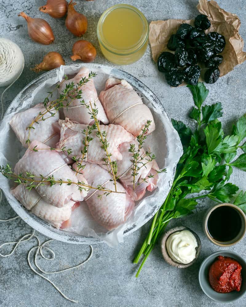 Ingredients for chicken braised with prunes and shallots