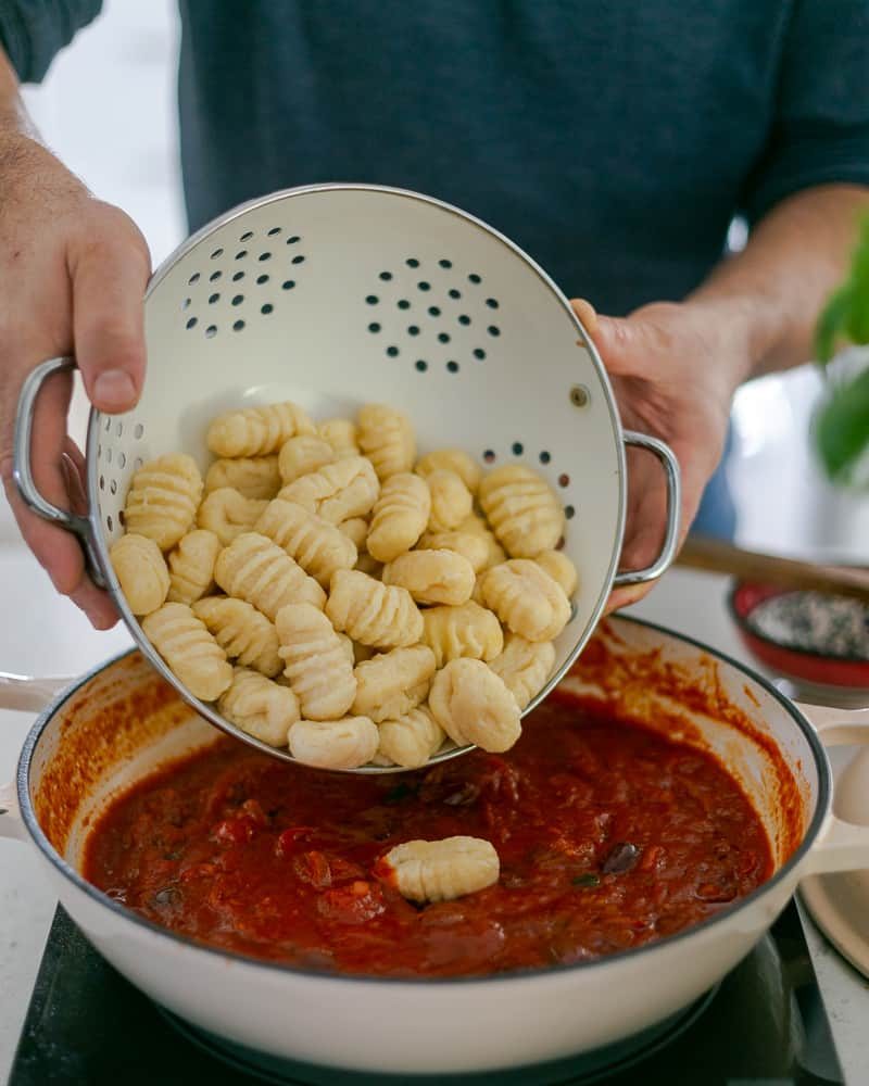 Adding-Gnocchi-to-sauce-in-pan-21-of-1