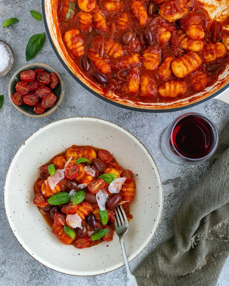 Plating and garnish idea for Easy Ricotta Gnocchi's with tomatoes and olives