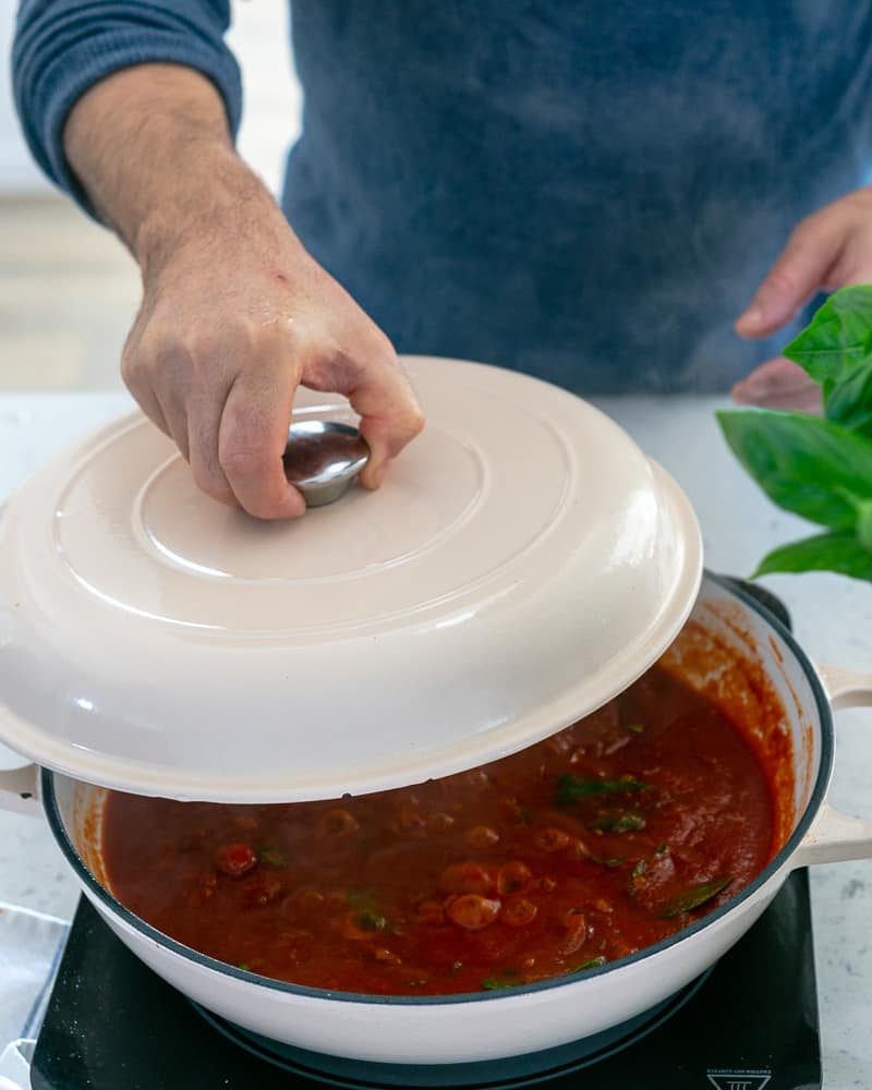 Steps involved in making the sauce for Ricotta Gnocchi's with tomatoes and olives