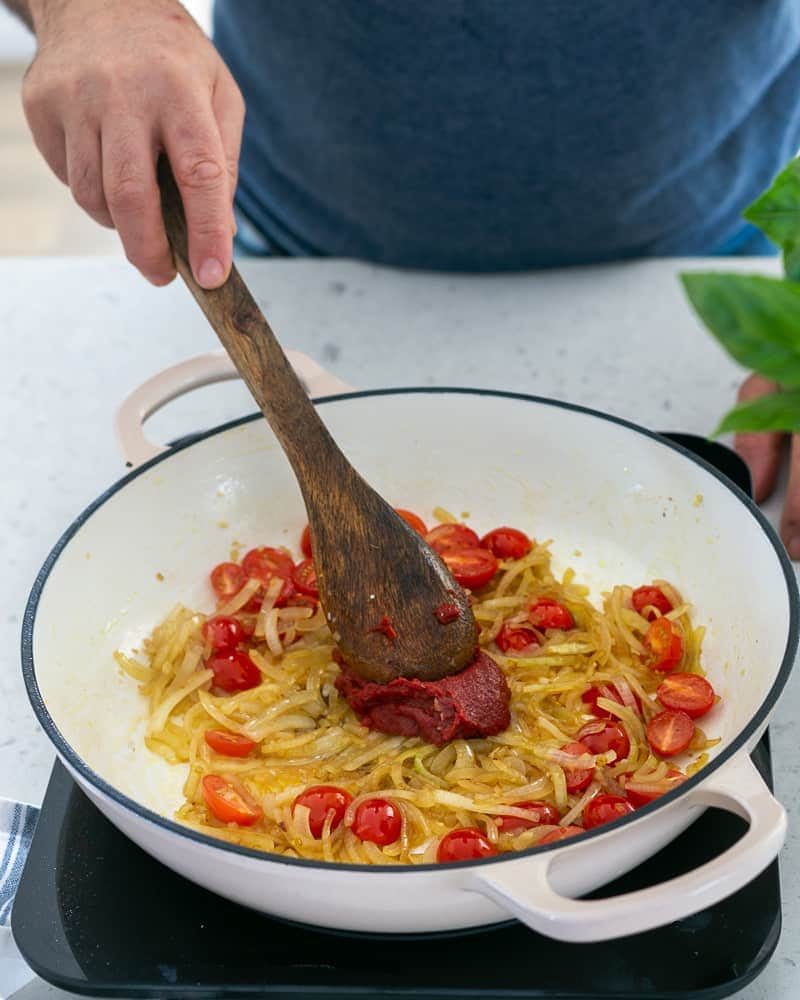 Steps involved in making the sauce for Ricotta Gnocchi's with tomatoes and olives