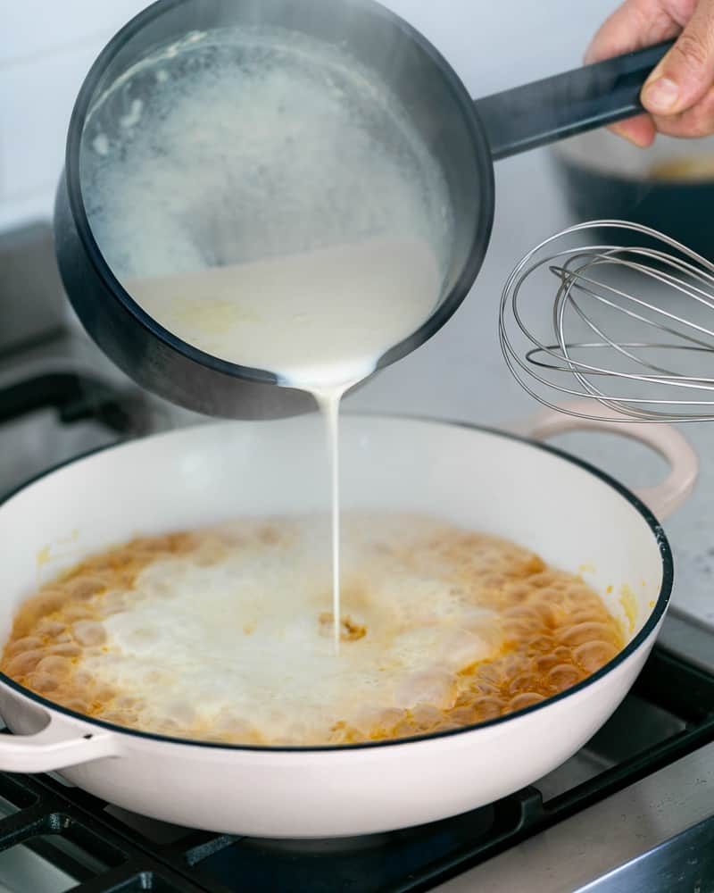 Cream and Milk mixture added to the caramel