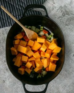 Cubes of Butternut Pumpkin squash added to the stew pot with slightly roasted vegetables