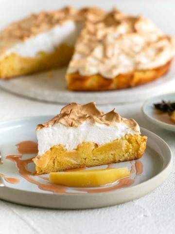 Slice of Quince Tart with Meringue on a plate