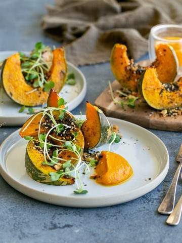 Roasted Pumpkin with Miso and Nori Nut Dukkah on a plate