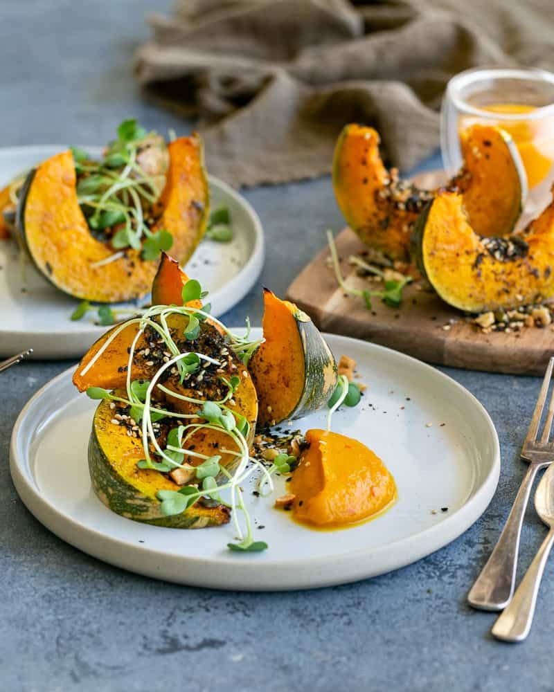 Roasted Pumpkin with Miso and Nori Nut Dukkah on a plate