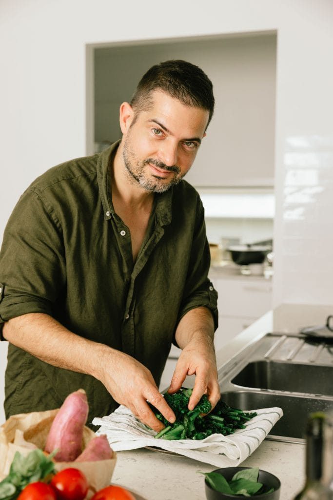 Etienne washing vegetables