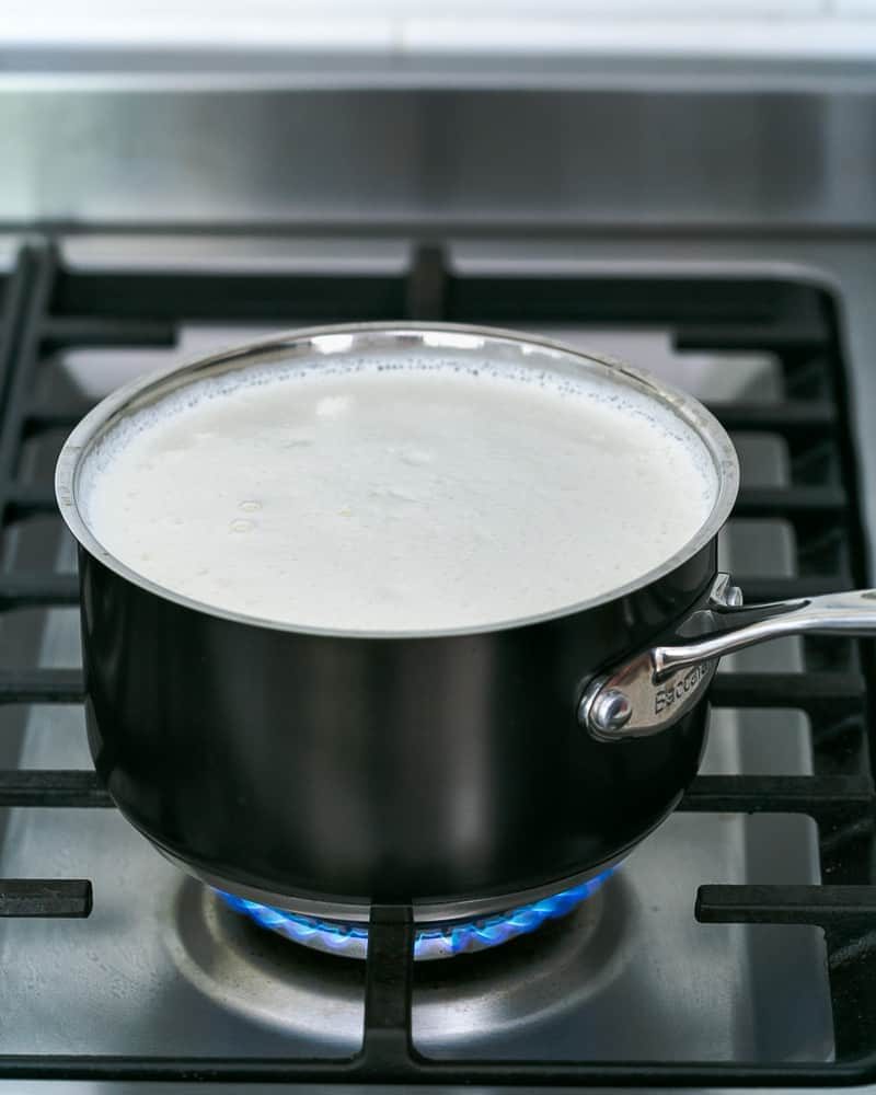 Boil full fat milk in a pan