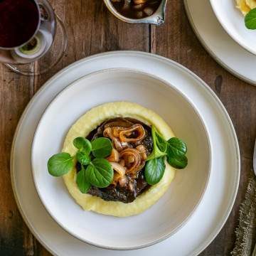 Braised Beef Cheeks with Shallot Jus in a bowl