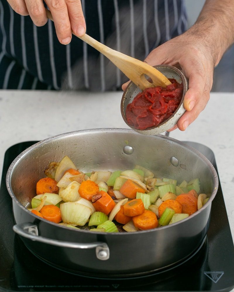 Tomato paste added to the mirepoix