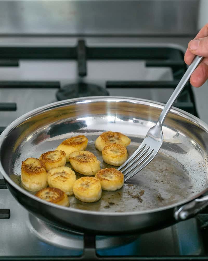 Caramelizing banana slices in butter for Dulce de Leche Verrine with Banana and whipped Cream