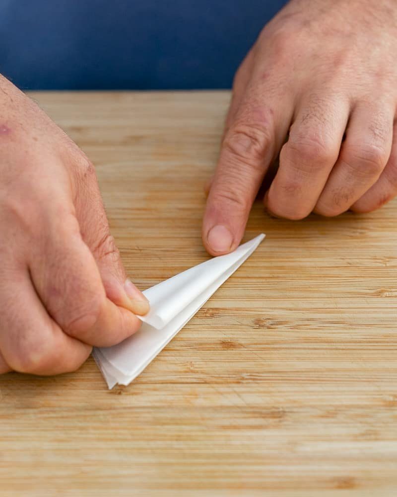 Steps to make cartouche for poaching pears