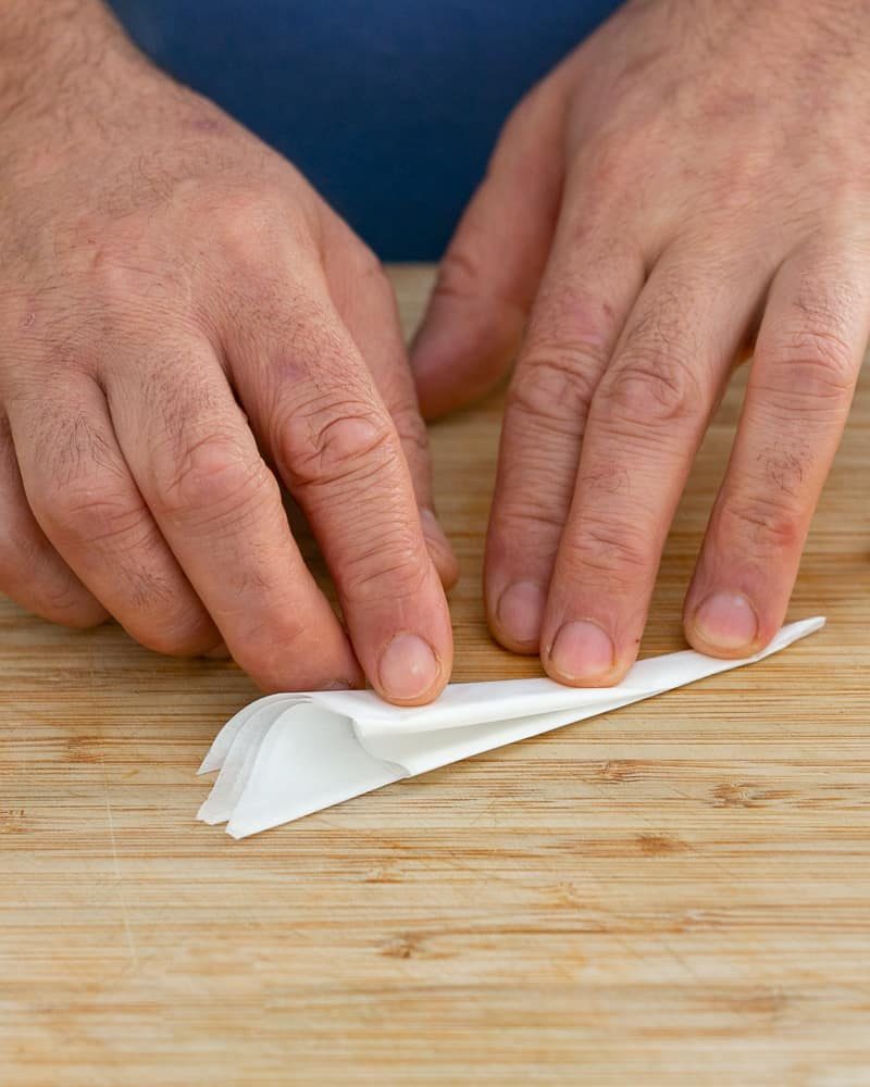 Steps to make cartouche for poaching pears