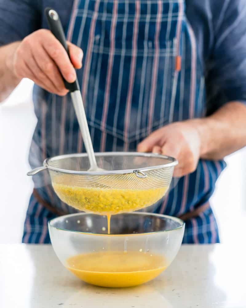 Blended Coconut curry sauce strained through a sieve