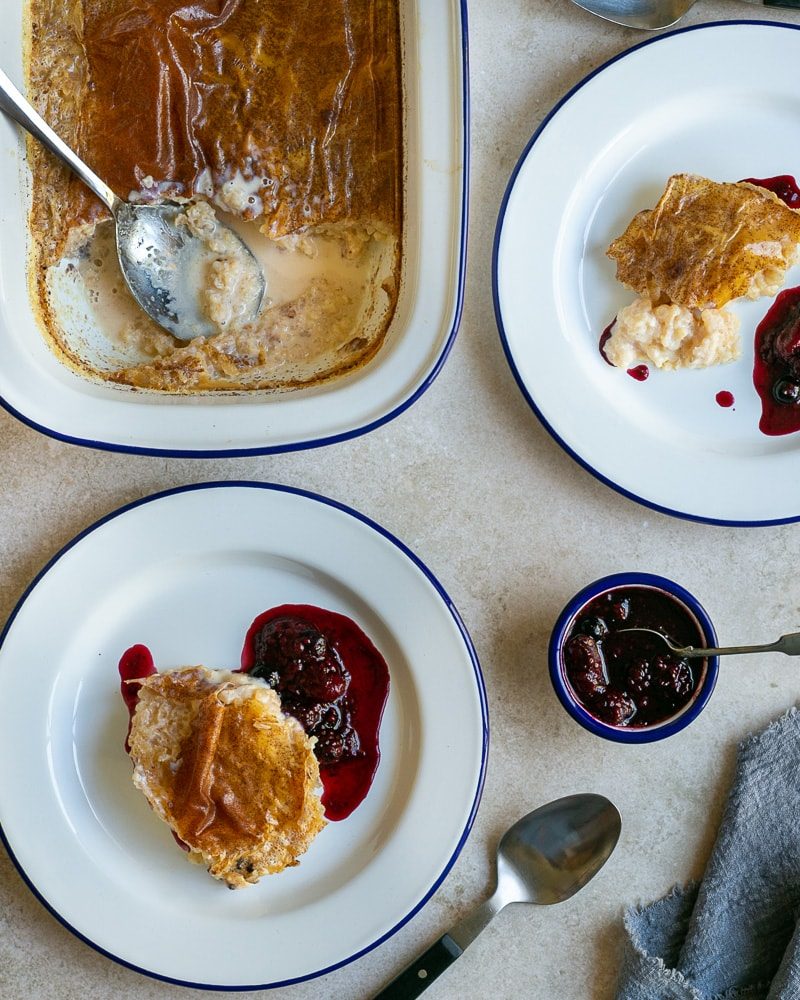 French Baked Rice Pudding served in plates with berry compote