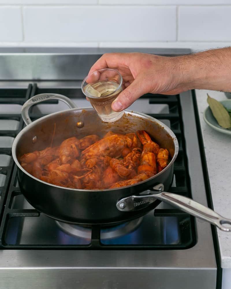 Deglazing pan with white wine while making prawn stock