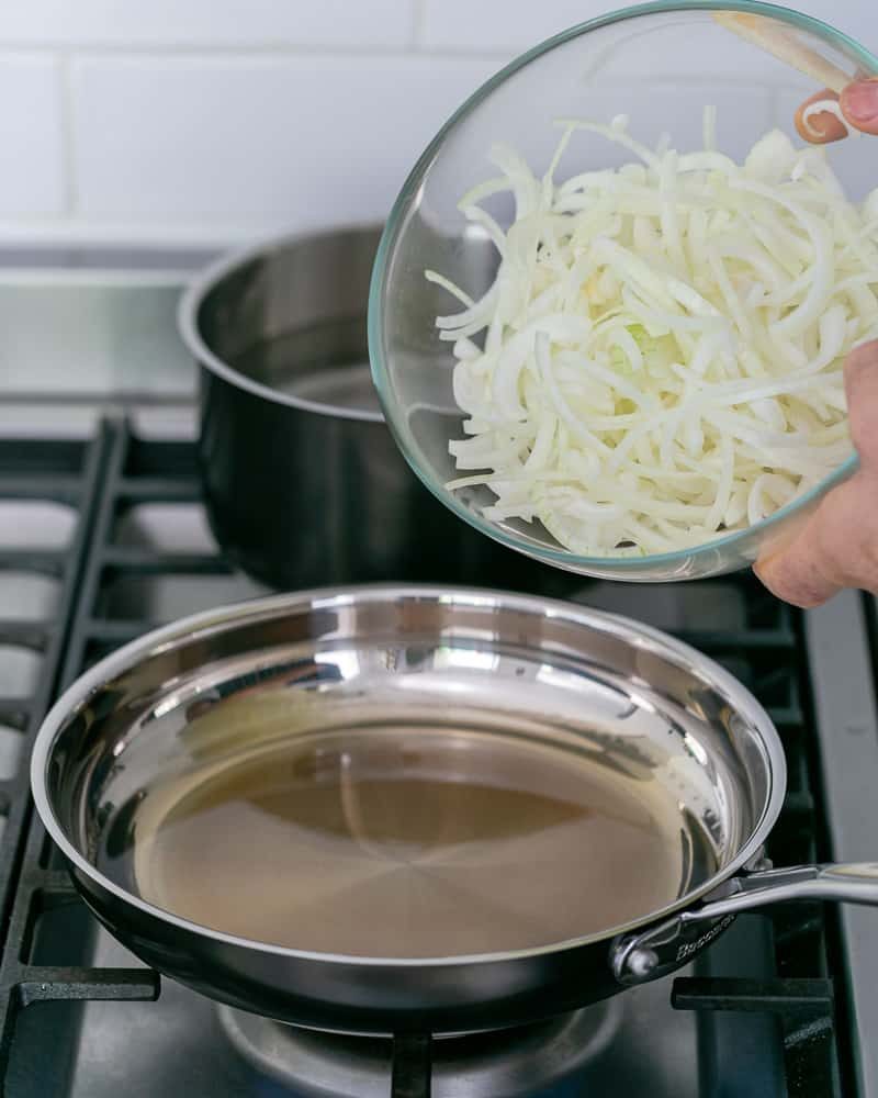 Sliced onions ready to be fried in hot oil