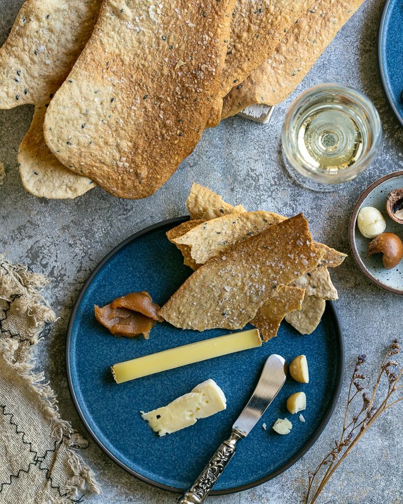 Spiced lavosh crackers with cheese and wine