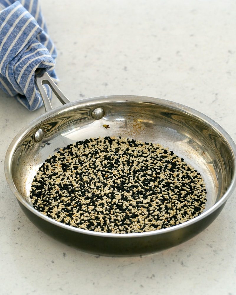 Toast sesame seeds in a pan