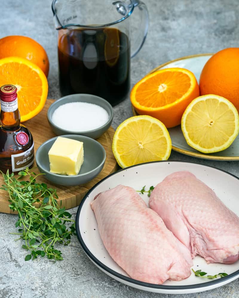 Ingredient shot includes oranges, lemons, butter, thyme, chicken jus, sugar and two duck breasts