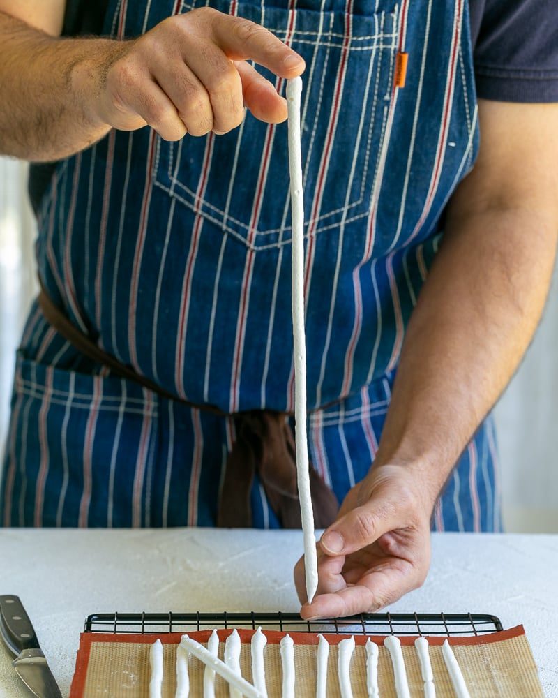 Meringue stick held with two hands