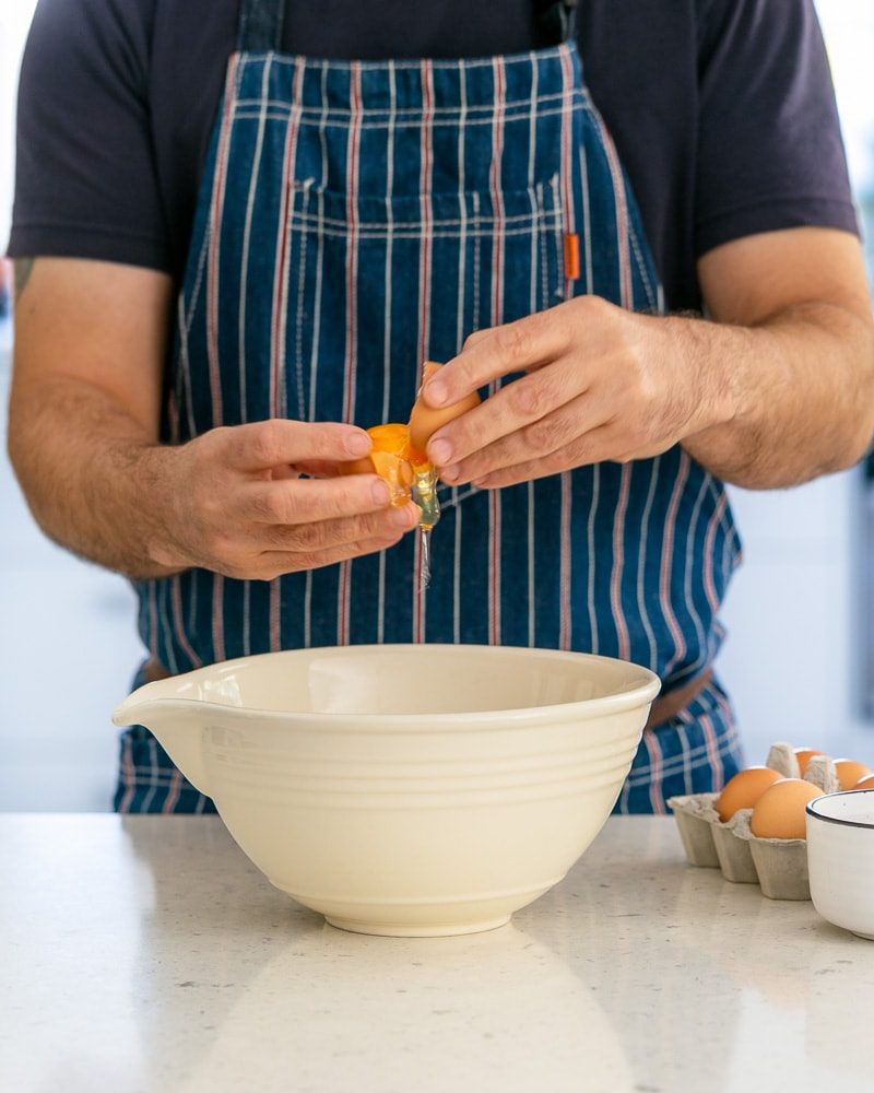 Separating egg whites from yolks to make meringue 