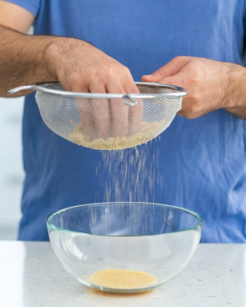 Nut brittle crumble through a sieve to get powder to make a tuile