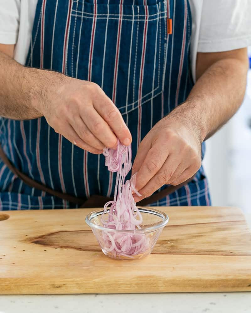 Onions after squeezing out excess water o make pickled red onions for garnish