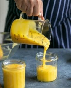 Passionfruit Curd in glass jars for storing in fridge