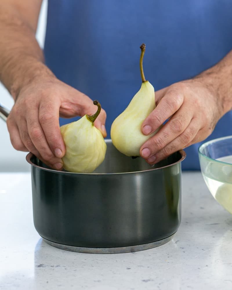 Add the peeled pears to a pot