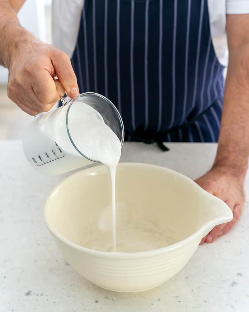 Coconut cream added to the mixing bowl