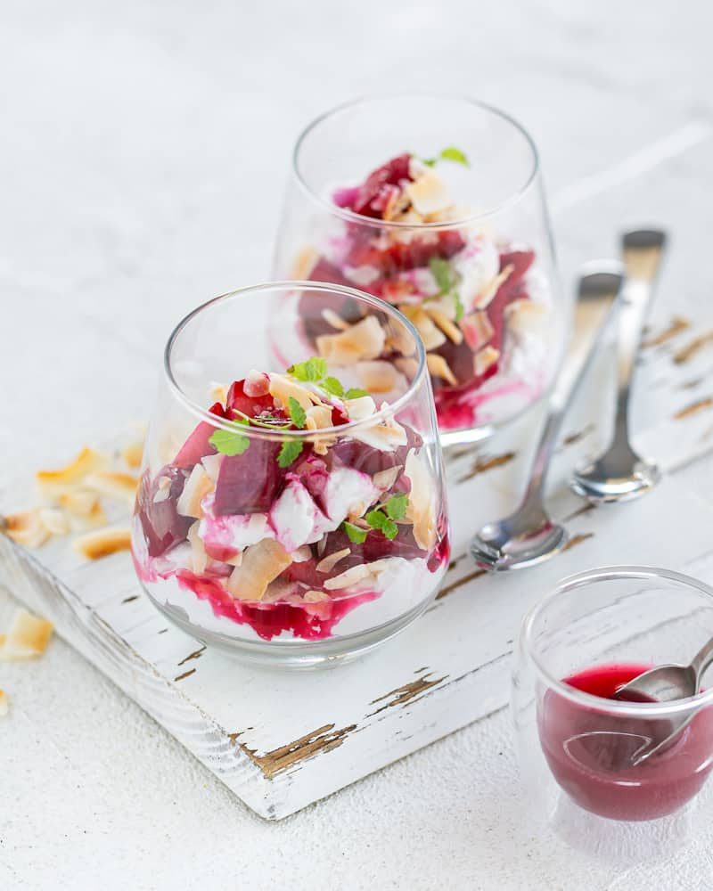 Poached Rhubarb with Strawberries and coconut chantilly in a glass dessert