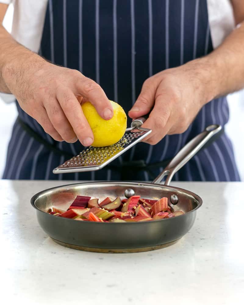 adding lemon zest to rhubarb poaching liquid