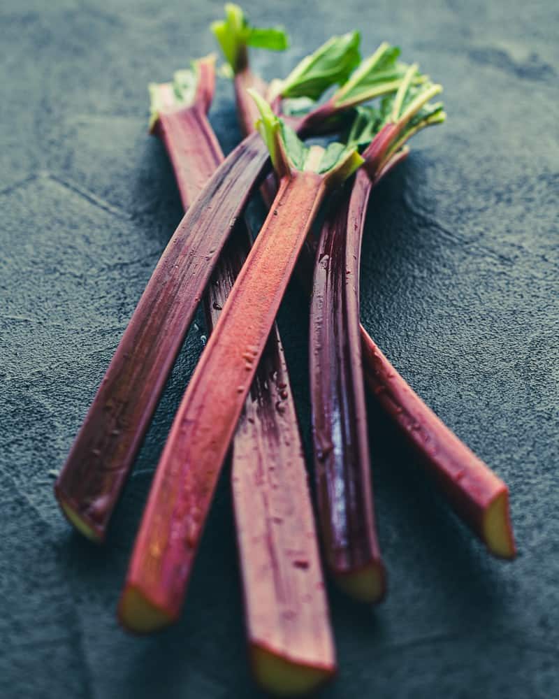 Fresh rhubarb stalks for Poached Rhubarb with Strawberries and Coconut Chantilly