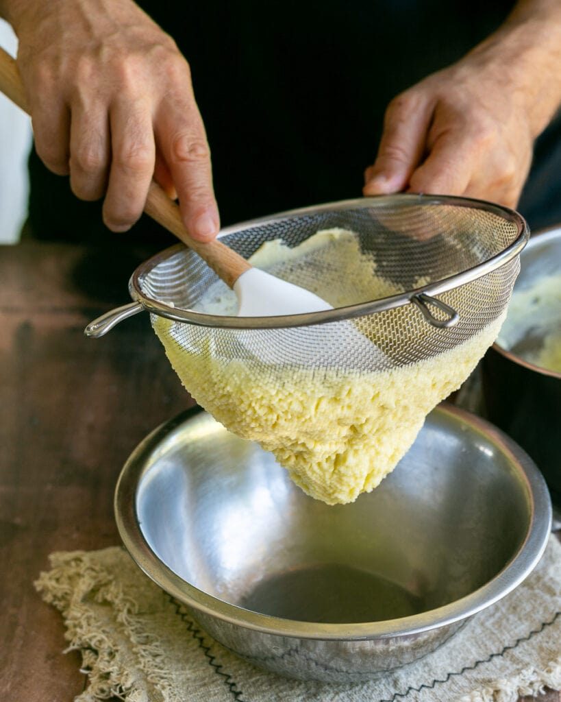 Passing Mashed potato through sieve for finer mash