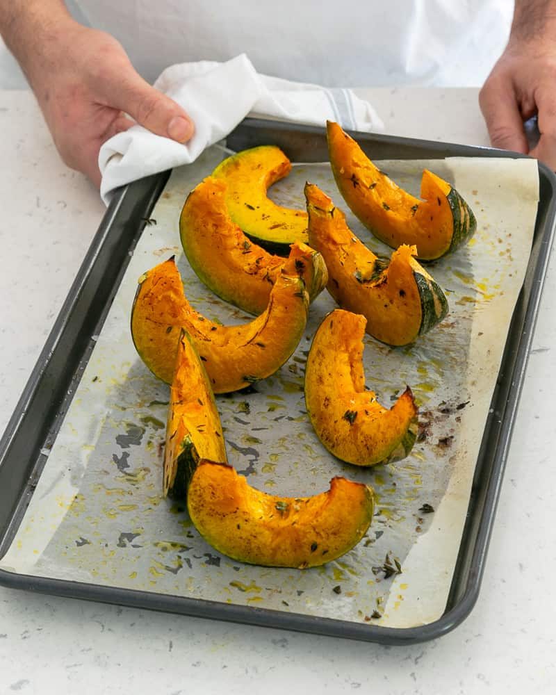 Roasted Pumpkin Sclices on a baking tray